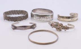 Six sterling silver bangles. 153.5 grammes.