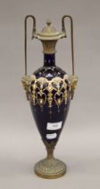 A 19th century gilt mounted porcelain lidded vase. 40 cm high.