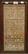 A framed and glazed Victorian sampler, worked with numbers and letters by Mary Samuel, aged 7 years.