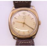 A 9 ct gold cased Tudor gentleman's wristwatch. 3 cm wide. 26.3 grammes total weight.