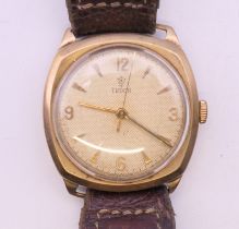 A 9 ct gold cased Tudor gentleman's wristwatch. 3 cm wide. 26.3 grammes total weight.
