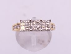 An 18 ct white and yellow gold 1 carat diamond cluster ring. Ring size Q/R. 4.