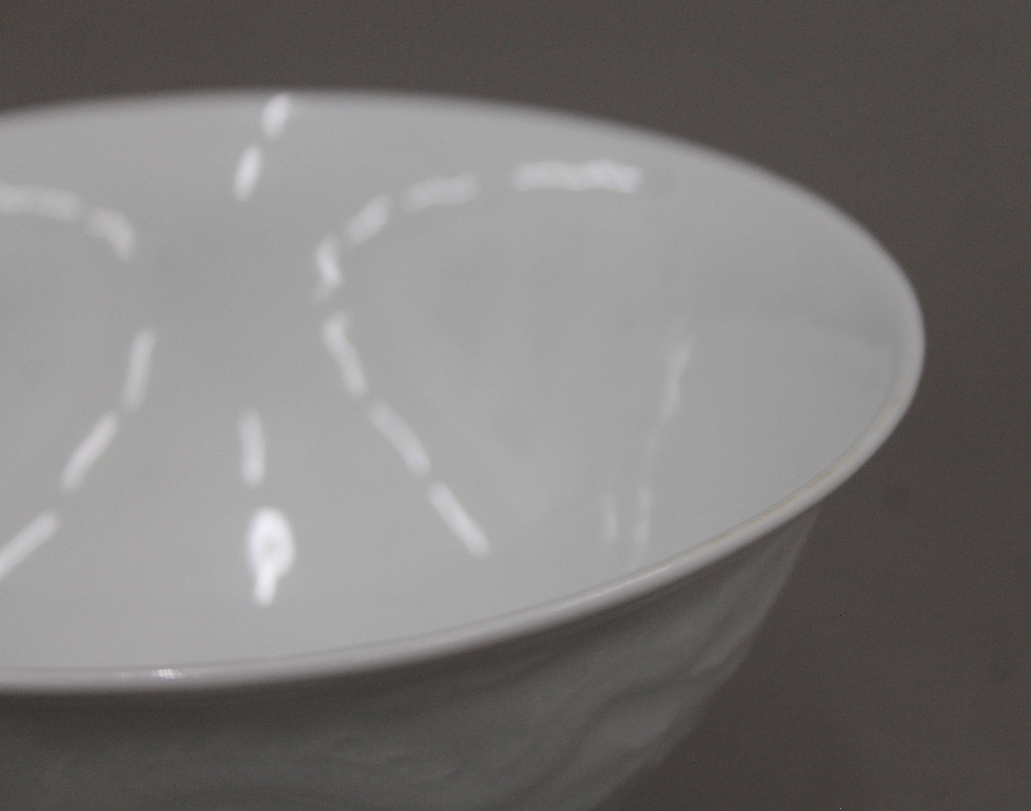 A Chinese white porcelain stem bowl, with moulded decoration of clouds and dragons, - Image 3 of 4