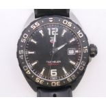 A Tag Heuer Formula 1 gentleman's wristwatch. 4 cm wide.