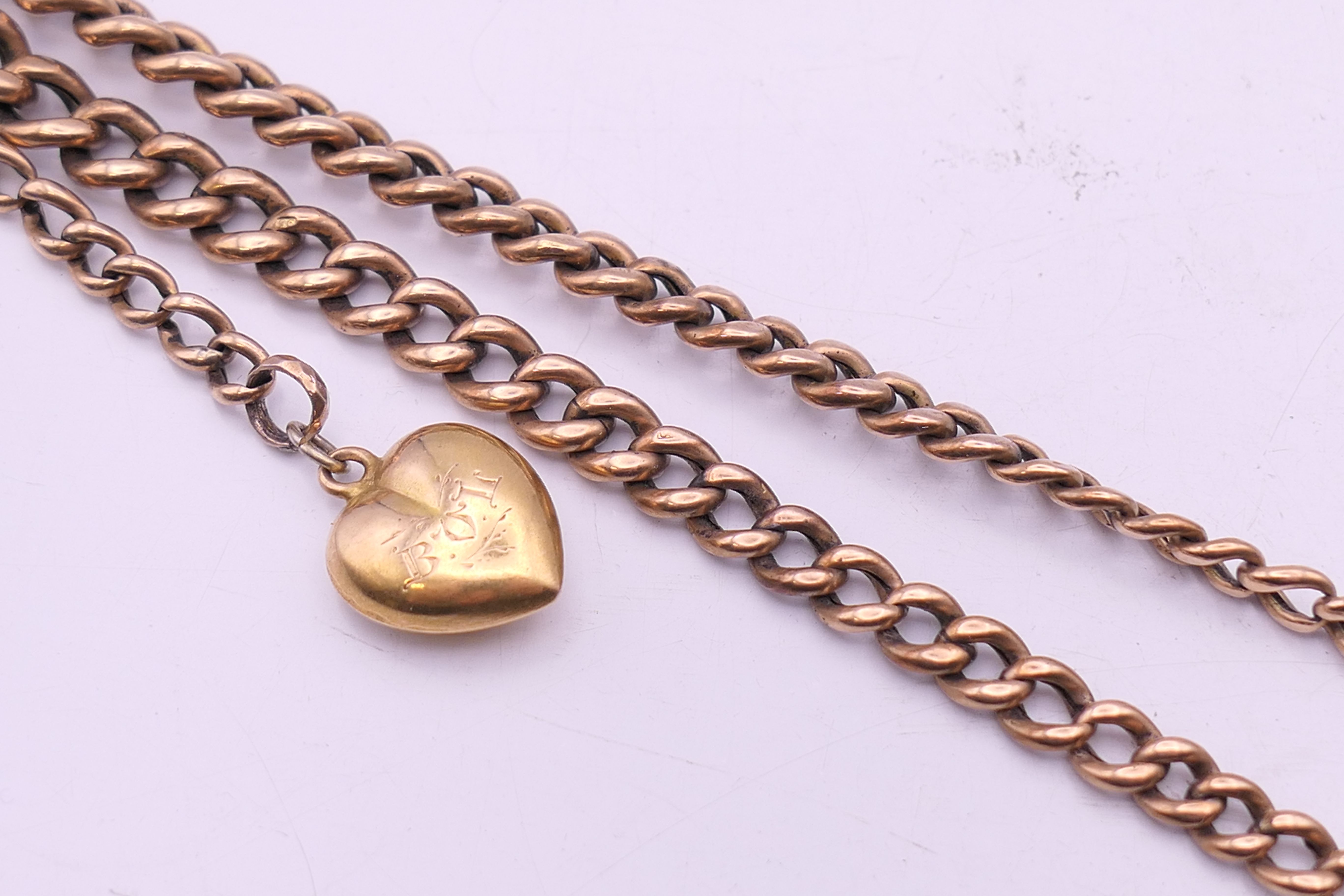 A 9 ct gold pocket watch on a 9 ct gold chain. 4.75 cm diameter, chain 35 cm long. The watch 78. - Image 15 of 17