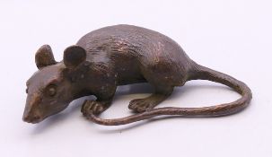 A bronze model of a rat. 8 cm long.