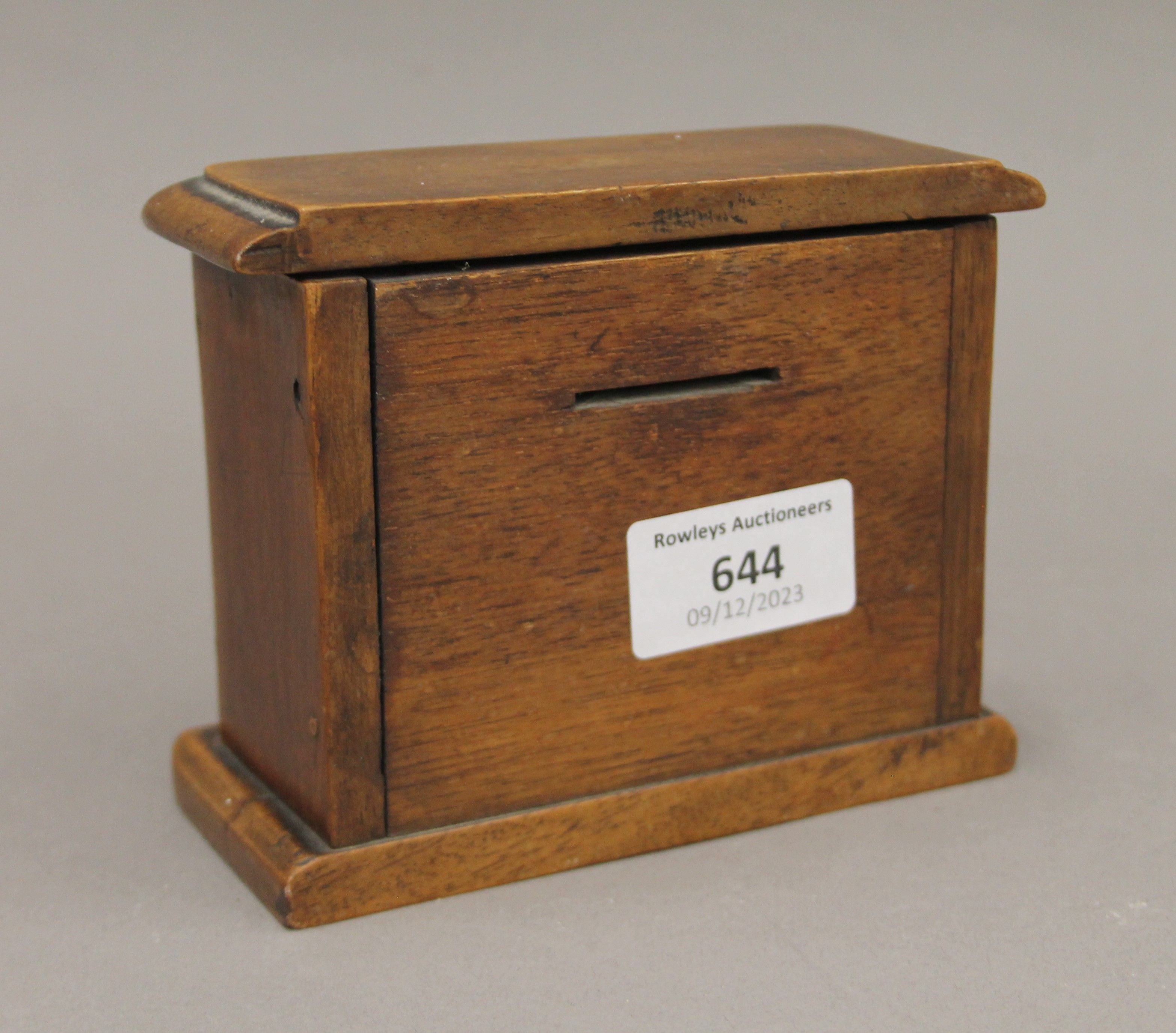 A money box formed as a Victorian chest of drawers. 12.5 cm wide. - Image 3 of 4