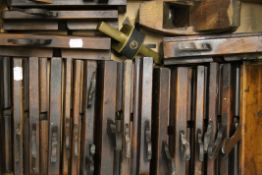 A large collection of cabinet makers' moulding planes.