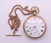 A 9 ct gold cased Waltham pocket watch inscribed to reverse 'Presented to T Judd Esq by C W