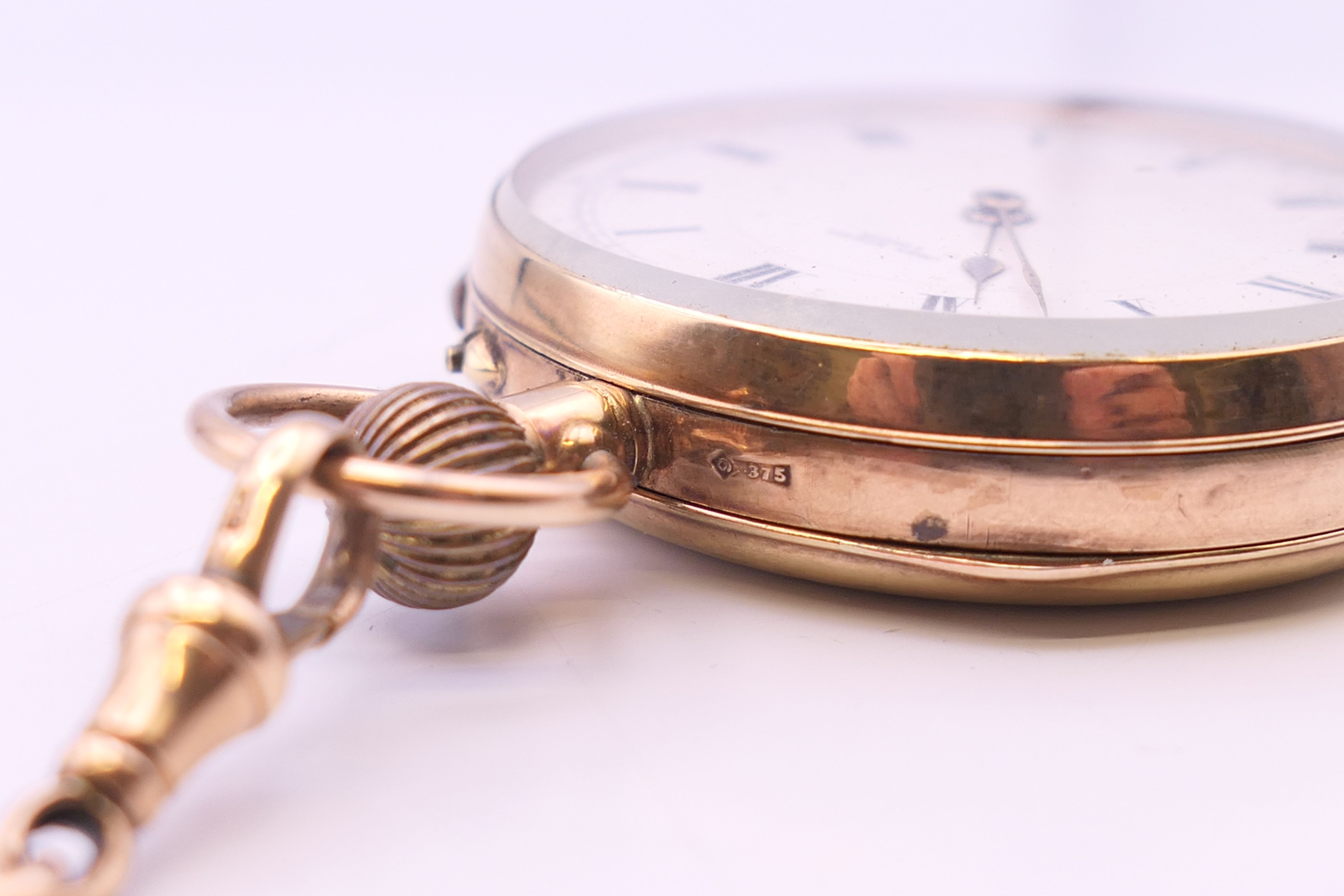 A 9 ct gold pocket watch on a 9 ct gold chain. 4.75 cm diameter, chain 35 cm long. The watch 78. - Image 5 of 17