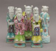 Five 18th century Chinese porcelain polychrome figures of dignitaries. The largest 22.5 cm high.