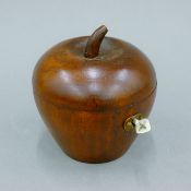 A tea caddy in the form of an apple. 11 cm high.