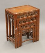 A nest of four Chinese tables. The largest 50 cm wide.