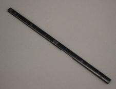 A Chinese hardwood ruler inlaid with silver. 35.25 cm long.