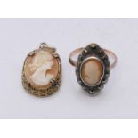 A 9 ct gold and silver cameo ring and a cameo pendant. Ring size K. Pendant 2 cm high.