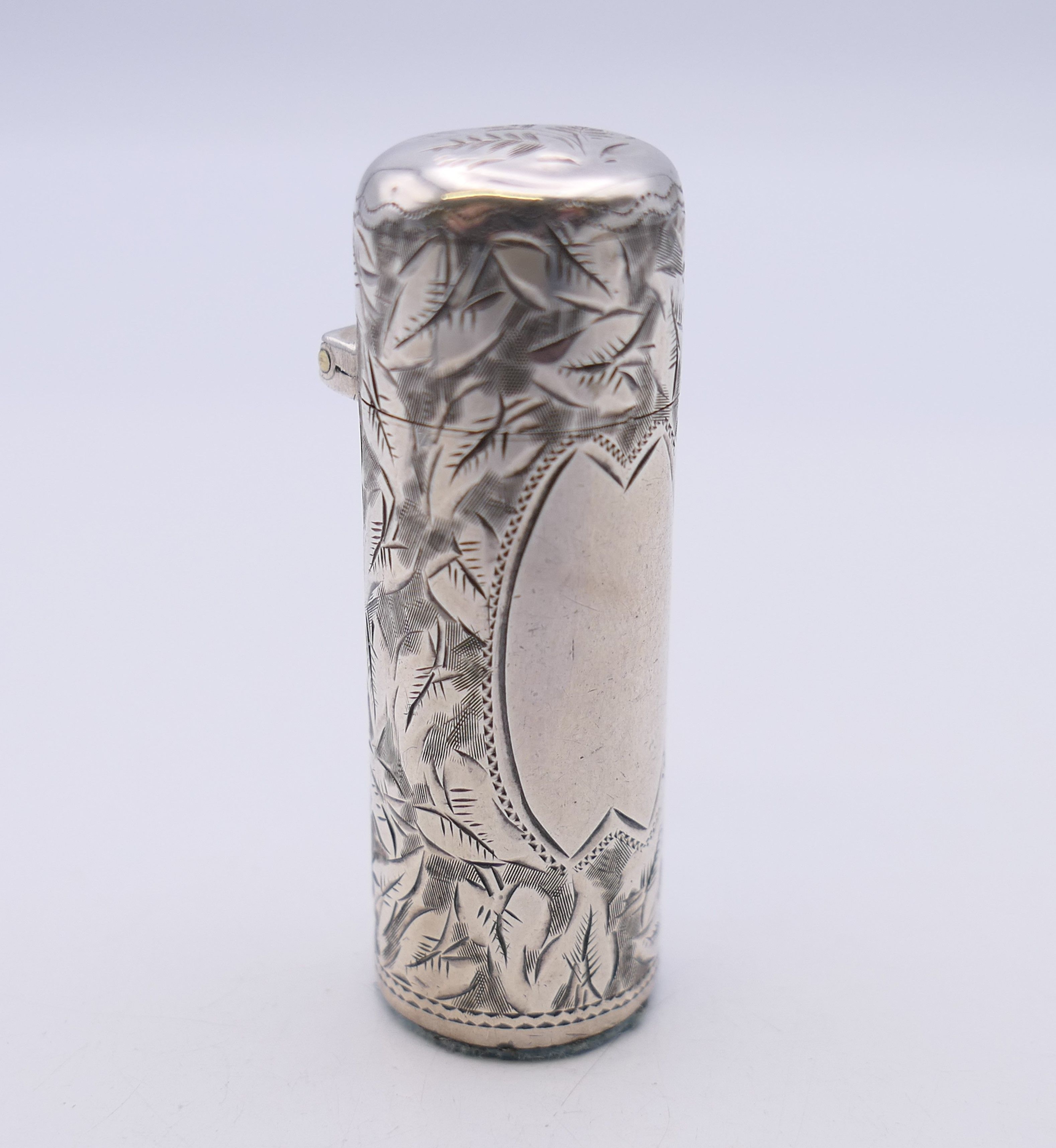 A silver scent bottle, hallmarked for Birmingham 1895. 5 cm high.