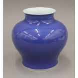 A Chinese porcelain blue ground vase of baluster form, with six character mark to base. 14.