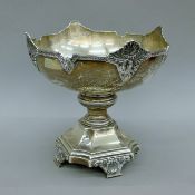 A silver centre bowl. 26 cm high. 41 troy ounces.