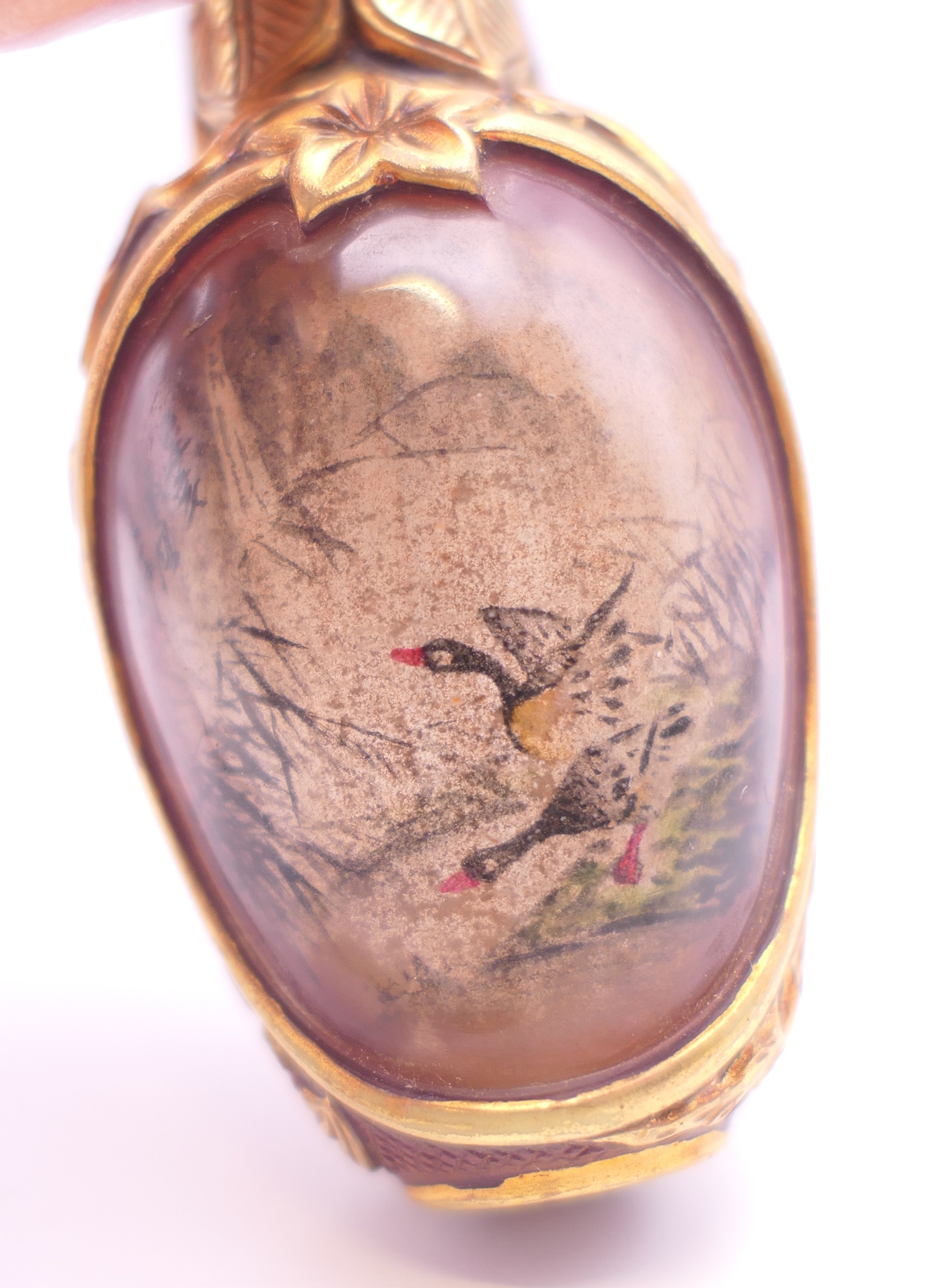 A Chinese gilded glass snuff bottle, inside painted duck scenes, artist Ding Erzhong, - Image 9 of 11