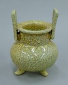 A Chinese crackle glaze pottery censer. 12 cm high.