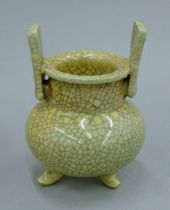 A Chinese crackle glaze pottery censer. 12 cm high.