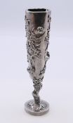 A Chinese silver vase. 15 cm high. 95.6 grammes.