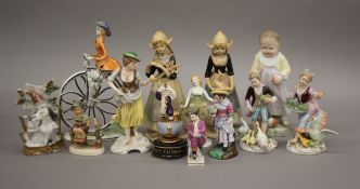 A quantity of various porcelain figurines. The largest 24 cm high.