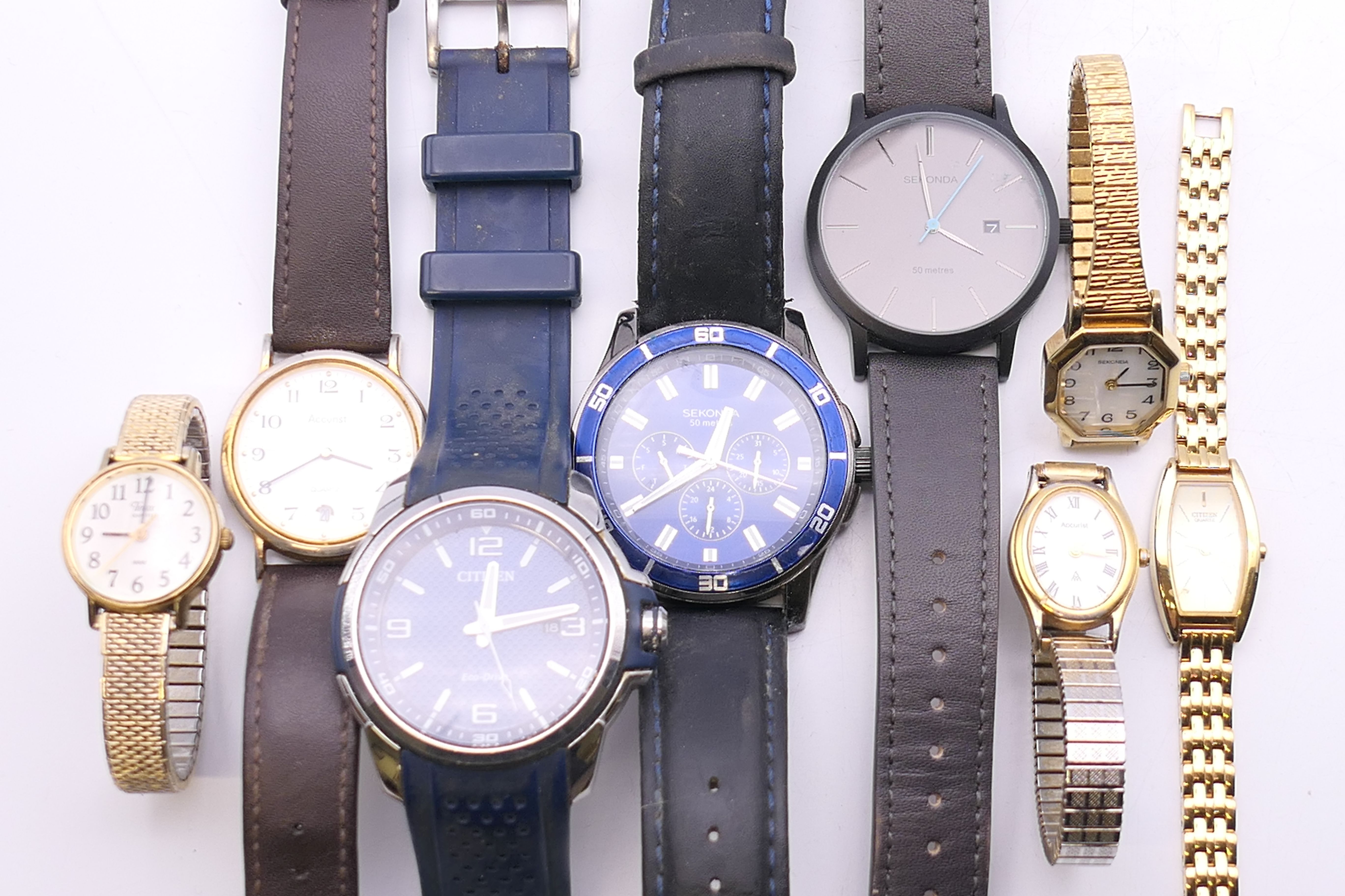 A quantity of various wristwatch, including Guess, Sekonda, Accurist, Citizen and Timex.