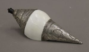 An Eastern white metal mounted shell. 21 cm long overall.