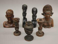 Seven African tribal wooden carvings. The largest 22.5 cm high.