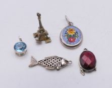 Five silver pendants. Fish form pendant 3.5 cm high.