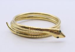 An 18 ct gold plated snake form bracelet.