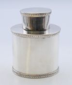 A small silver tea caddy. 8 cm high. 98.8 grammes.