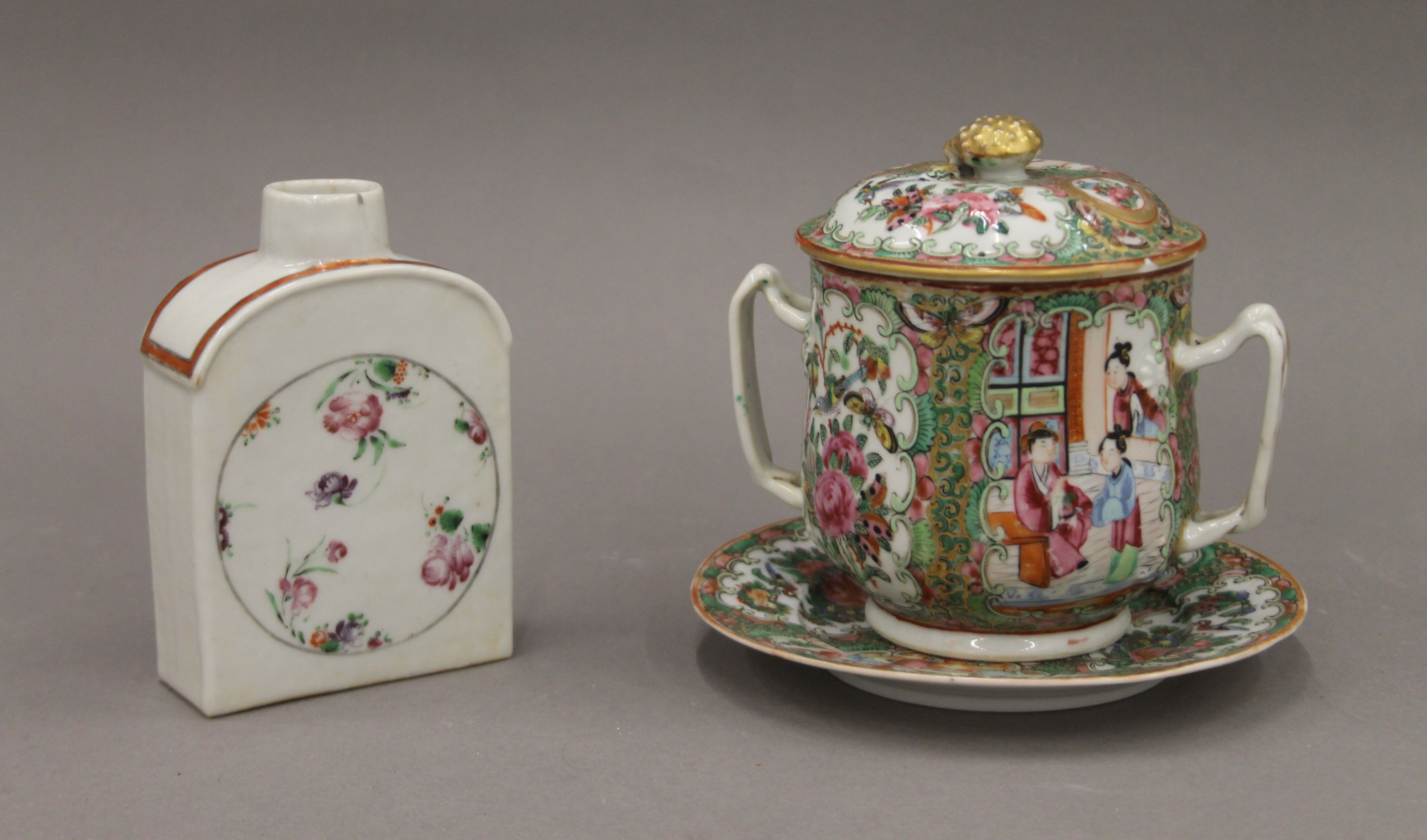 An 18th century Chinese famille rose porcelain tea caddy and a 19th century Canton porcelain twin