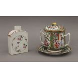 An 18th century Chinese famille rose porcelain tea caddy and a 19th century Canton porcelain twin