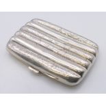 A silver cheroot case, hallmarked for Chester 1905. 9 cm x 6 cm. 49.3 grammes total weight.