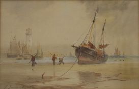 19TH CENTURY SCHOOL, Beached Ship Before a Lighthouse, watercolour, indistinctly signed,