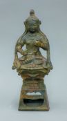 A bronze seated model of Buddha. 23.5 cm high.