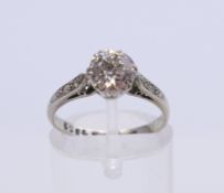 An 18 ct white gold old cushion cut diamond solitaire ring. Diamond weight approximately 1.