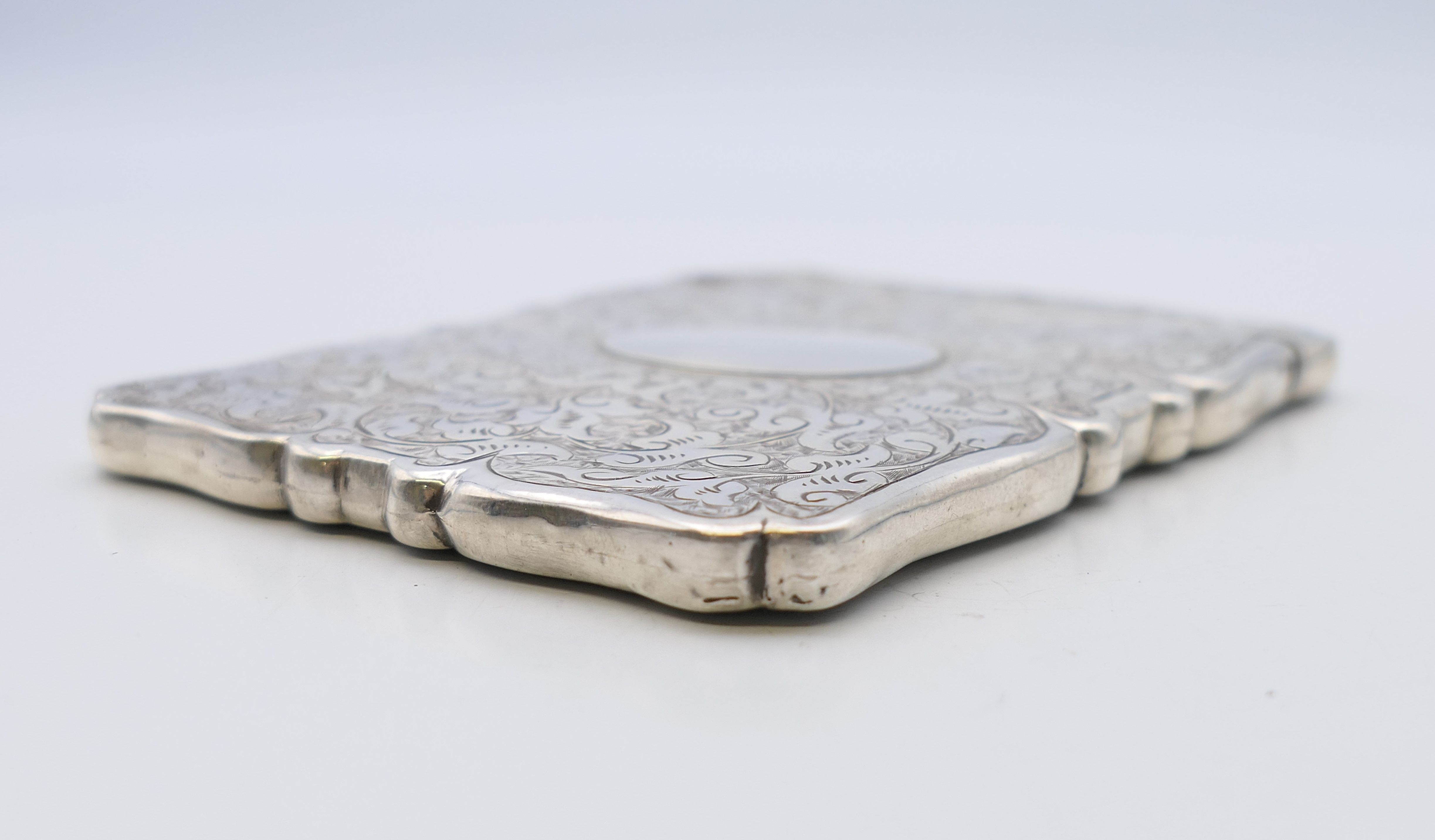 A silver card case, hallmarked for Birmingham 1886. 10 cm x 7 cm. 49.2 grammes. - Image 3 of 7