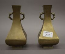 A pair of Chinese bronze vases. 17 cm high.