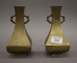 A pair of Chinese bronze vases. 17 cm high.