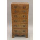 A 20th century chest of six drawers of slender proportion. 45.5 cm wide.