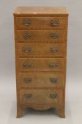 A 20th century chest of six drawers of slender proportion. 45.5 cm wide.