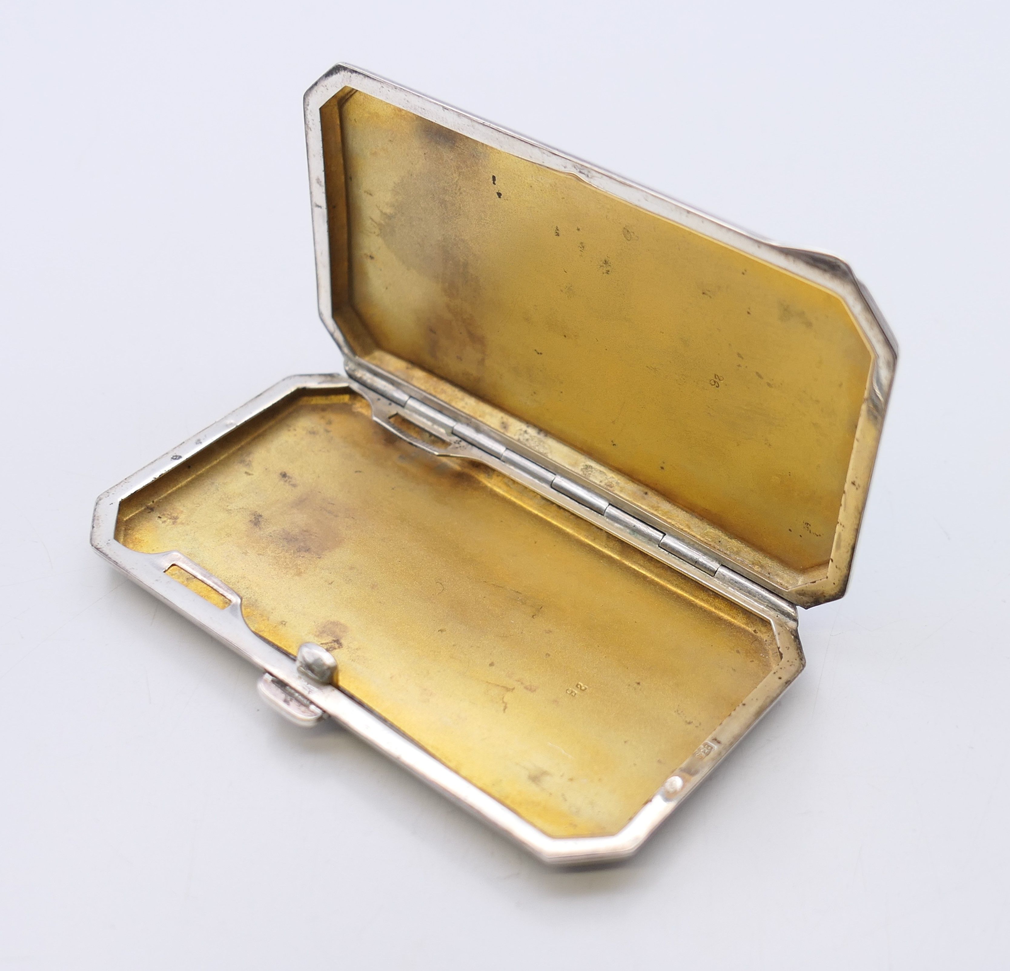 An early 20th century enamel decorated silver cigarette case. 8 cm x 4.5 cm. - Image 4 of 9