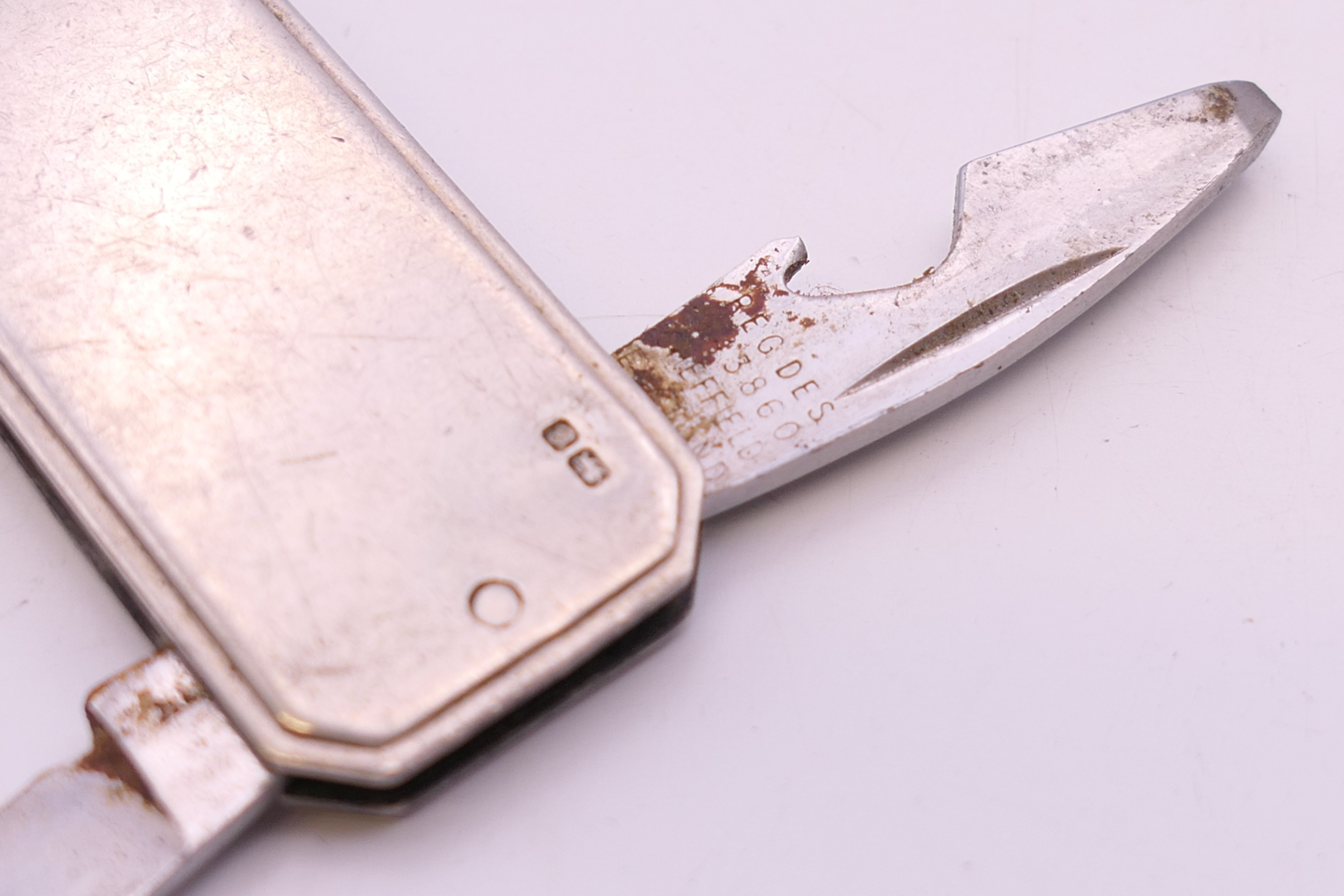 A silver cased penknife. 4.5 cm x 2 cm. 26 grammes total weight. - Image 4 of 4
