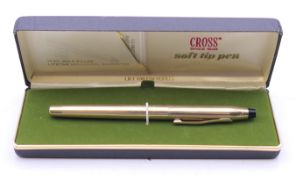 A boxed Cross soft tip pen.