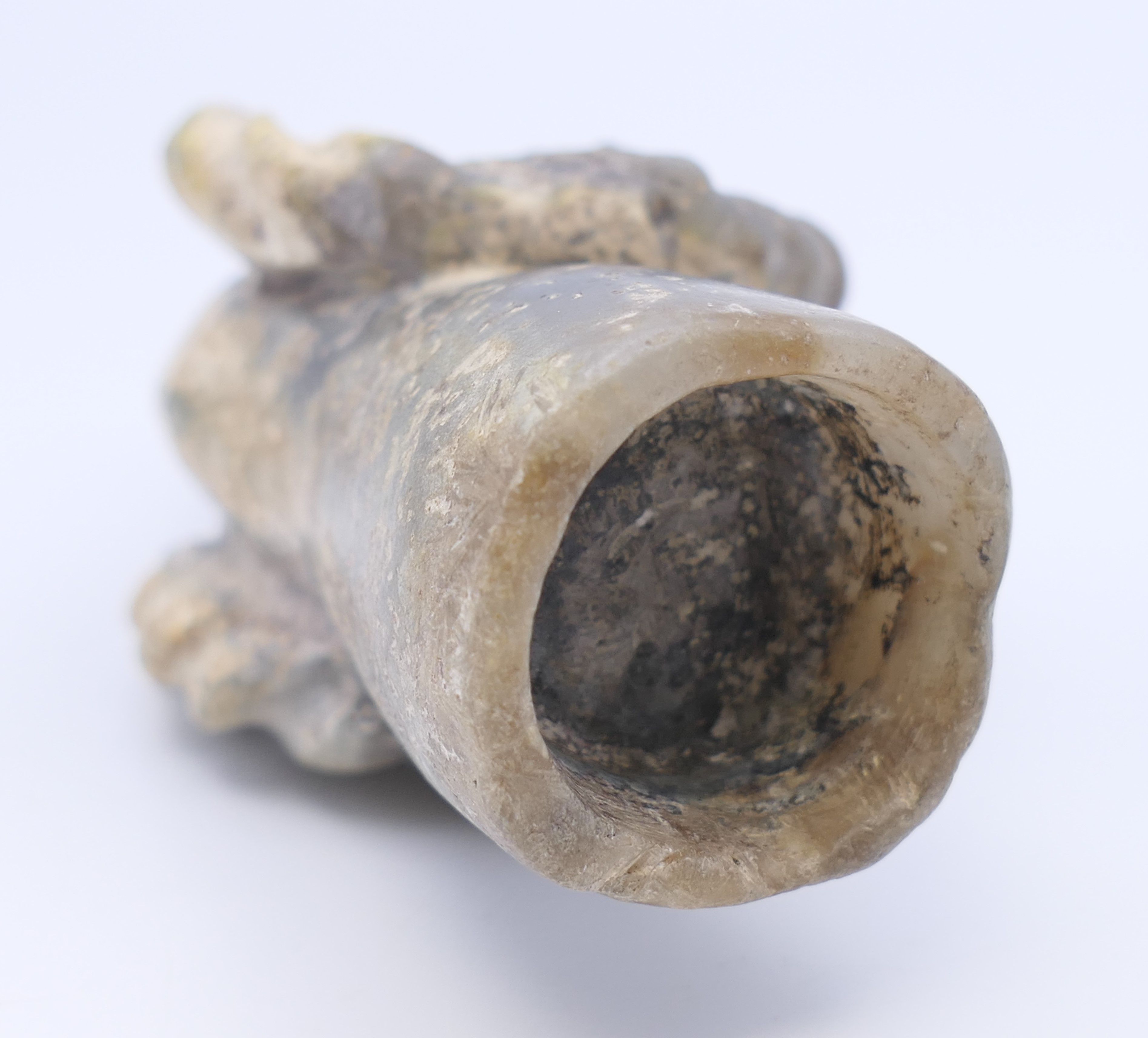 A Chinese white and grey jade rams head, Han Dynasty. 9.5 cm long. - Image 6 of 7