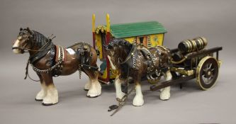 Two porcelain cart horses with a cart and a gypsy caravan. The caravan 27 cm high.