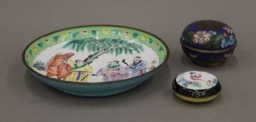A Chinese Canton enamel saucer dish painted with a horse and rider,